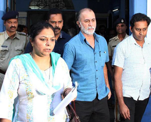 Tarun Tejpal booked for using mobiles in prison